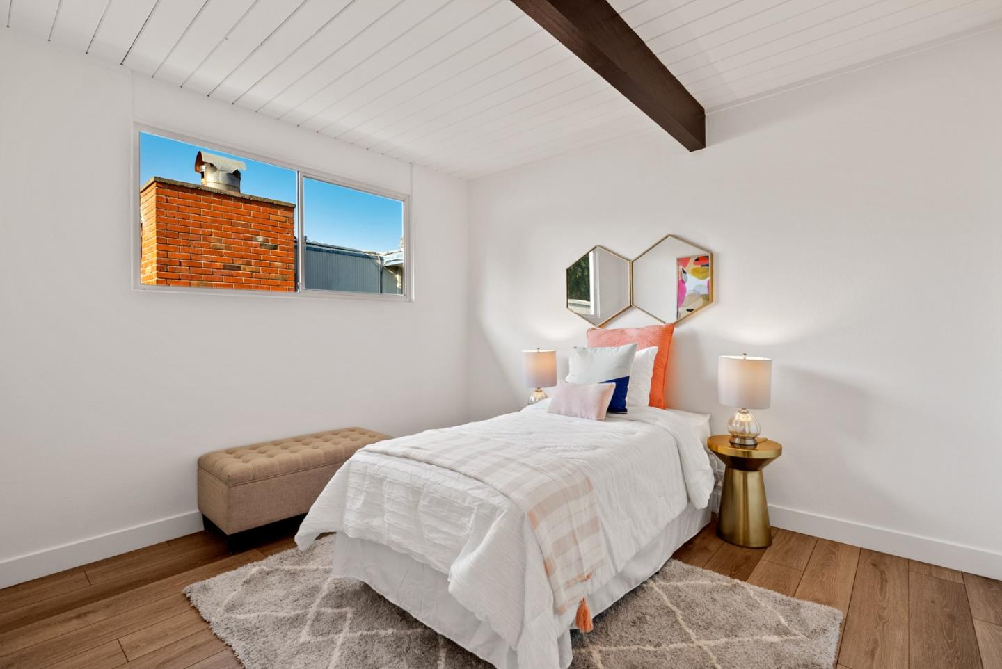 1420 Mallard Way Sunnyvale, CA 94087 - Photo 36 of 48 a bedroom with a bed and a lamp