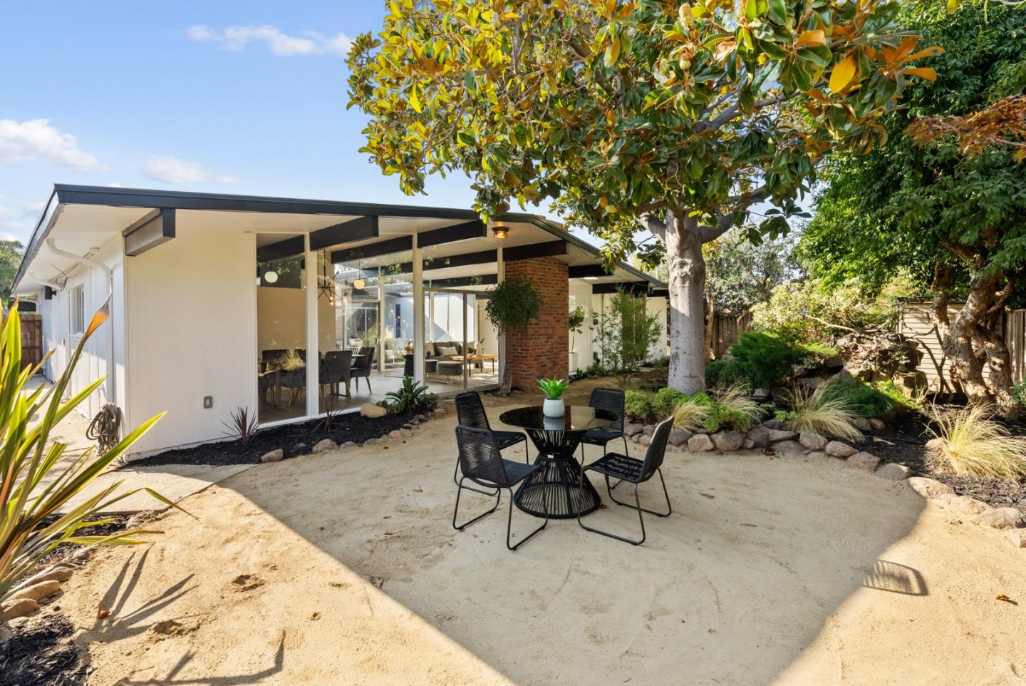1420 Mallard Way Sunnyvale, CA 94087 - Photo 40 of 48 a view of a house with backyard sitting area and garden