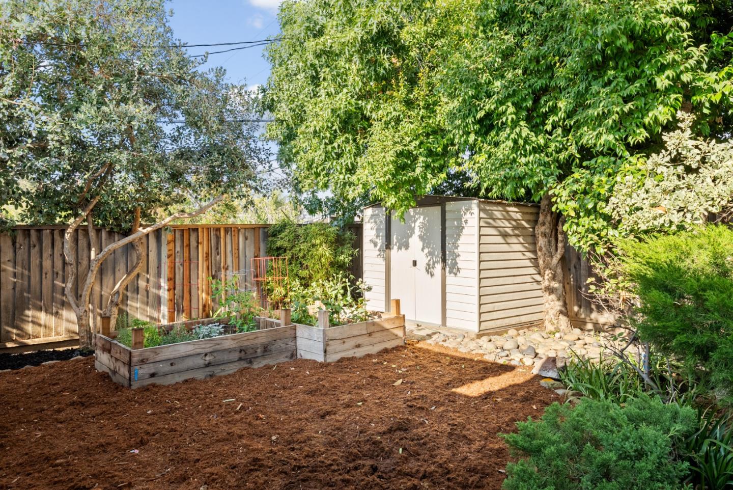 1420 Mallard Way Sunnyvale, CA 94087 - Photo 43 of 48 a backyard of a house with table and chairs
