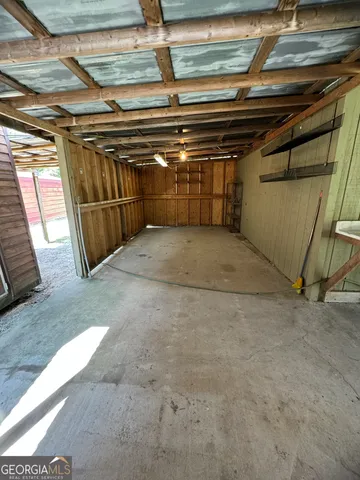 a view of a park that has large trees