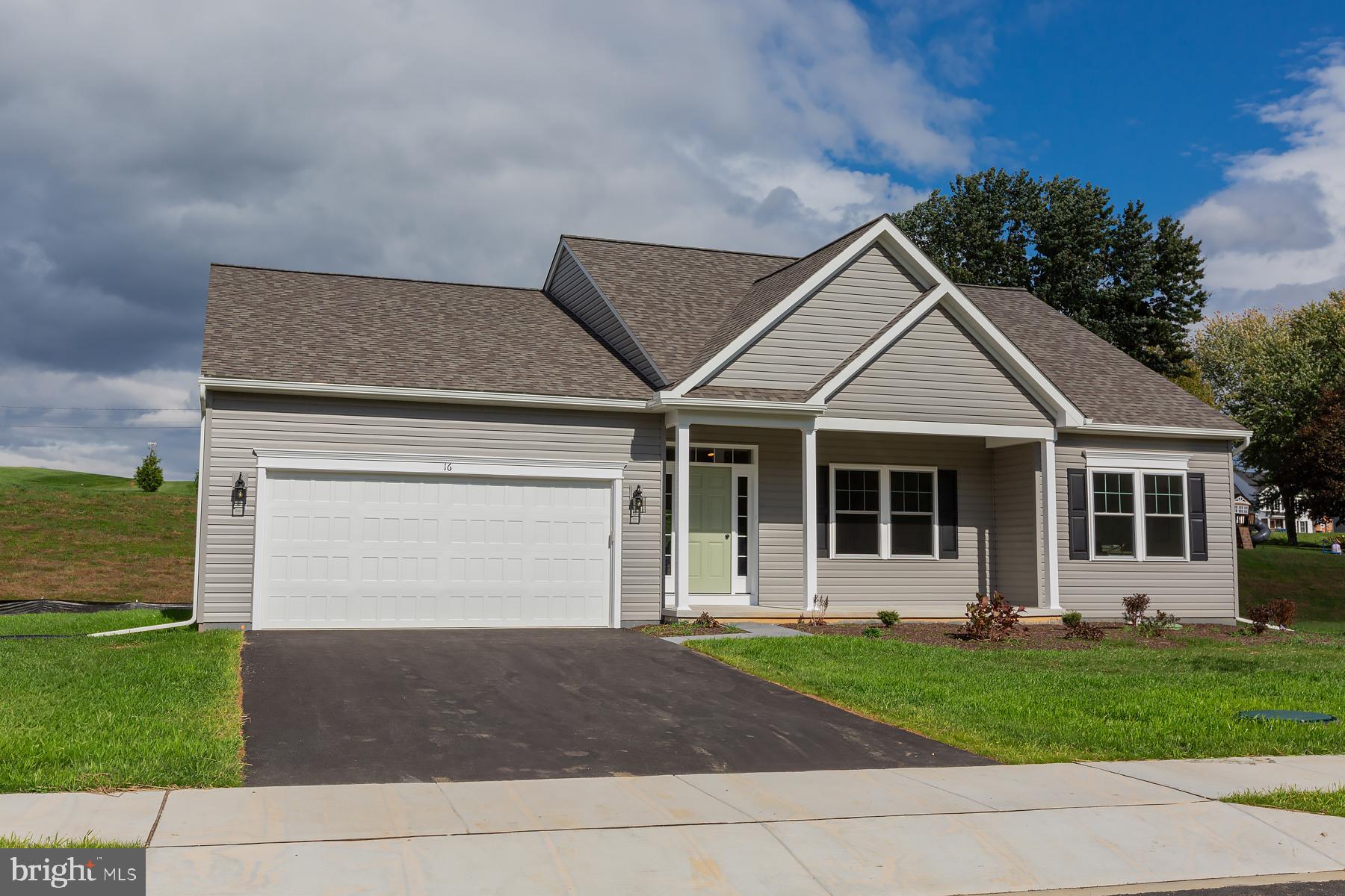 16 Ridgewood Road, Unit (DOUGLAS) Quarryville, PA 17566 - Photo 5 of 61 a front view of a house with garden