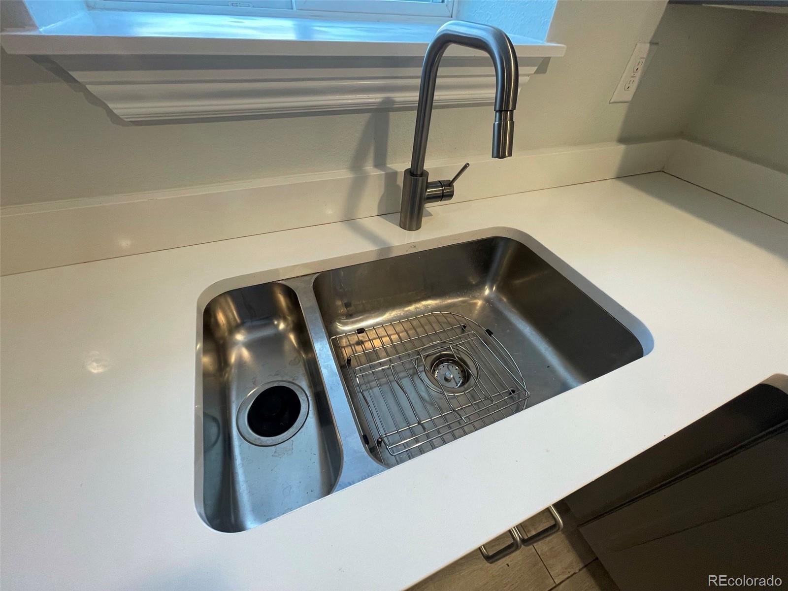 1691 Monroe Street Denver, CO 80206 - Photo 15 of 31 a close view of sink and stove