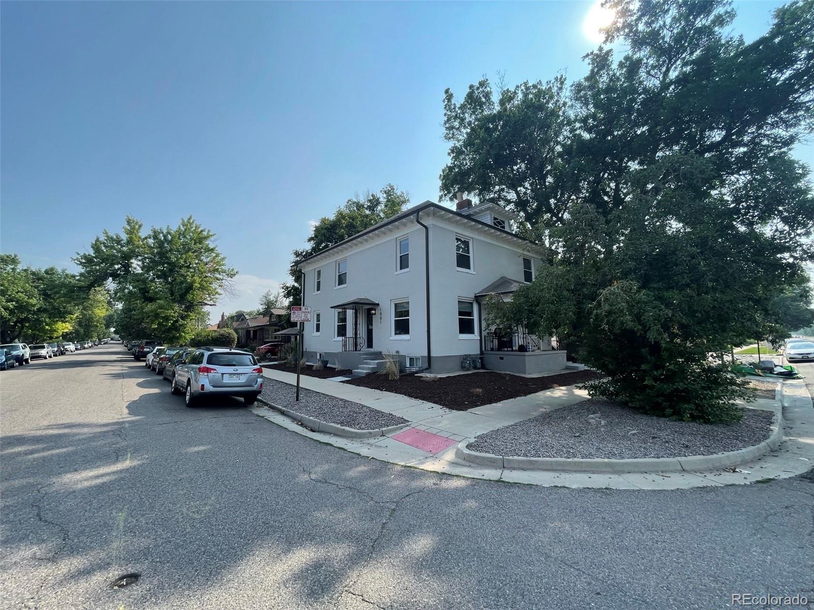 1691 Monroe Street Denver, CO 80206 - Photo 20 of 31 a view of street with parked cars