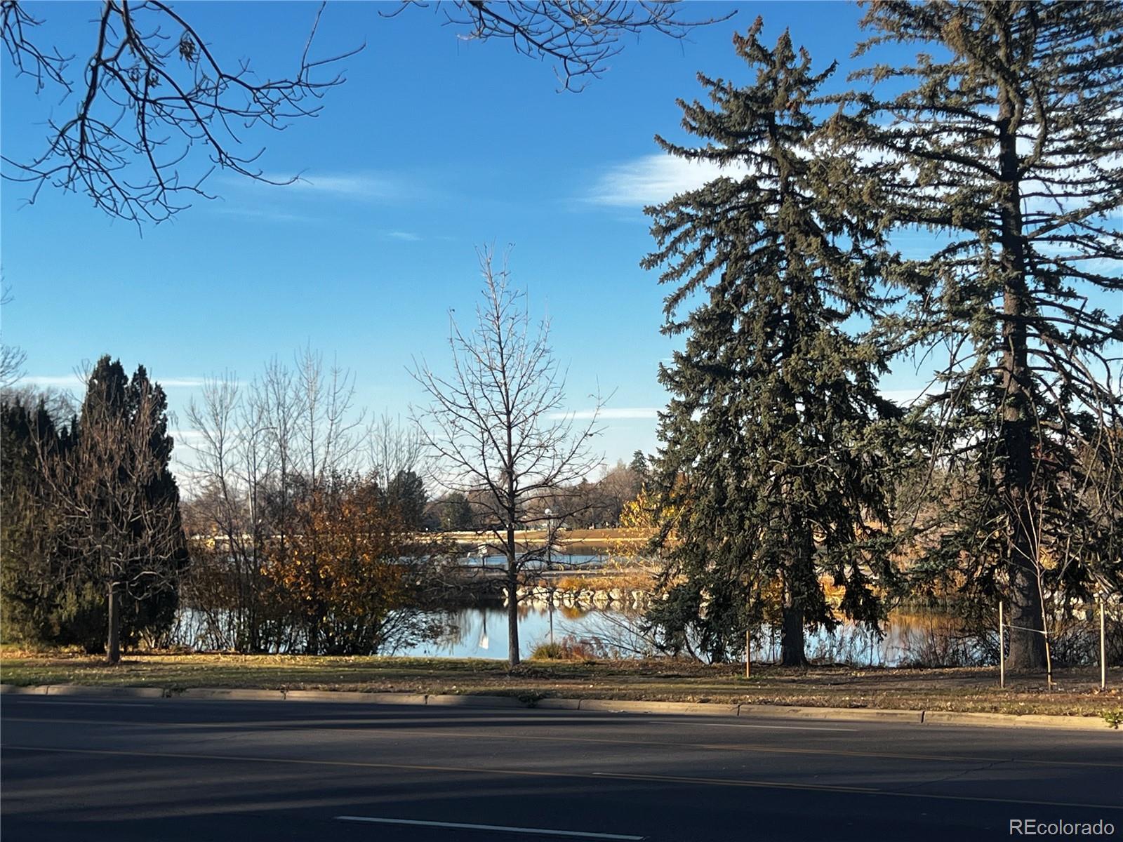 1691 Monroe Street Denver, CO 80206 - Photo 26 of 31 a view of street along with trees