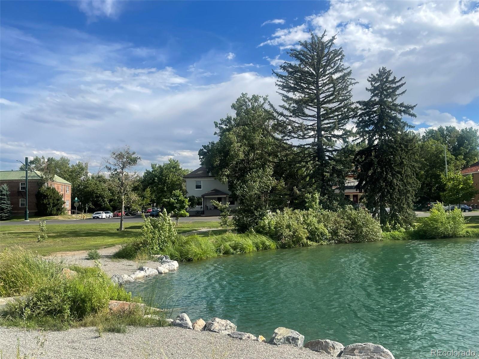 1691 Monroe Street Denver, CO 80206 - Photo 29 of 31 a view of a park with large trees