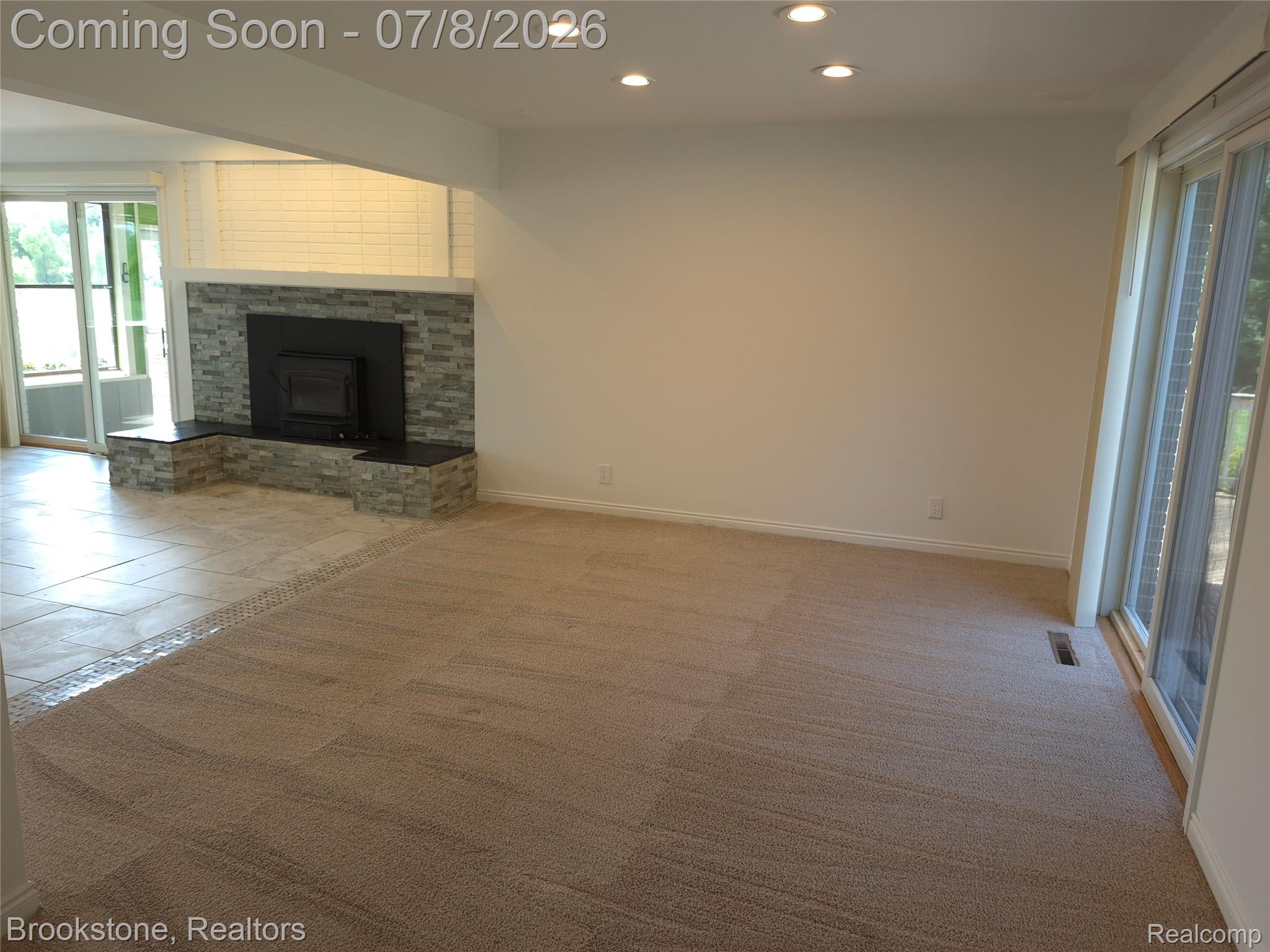 4140 South Henderson Road Davison, MI 48423 - Photo 31 of 98 Living area featuring recessed lighting and neutral wall tones