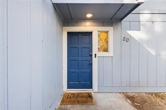 a view of entryway with a rug and a window
