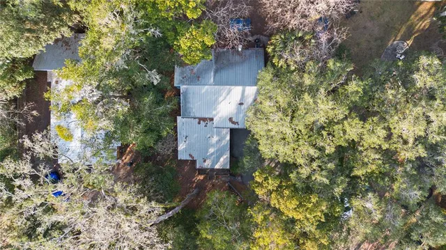 an aerial view of residential house with outdoor space