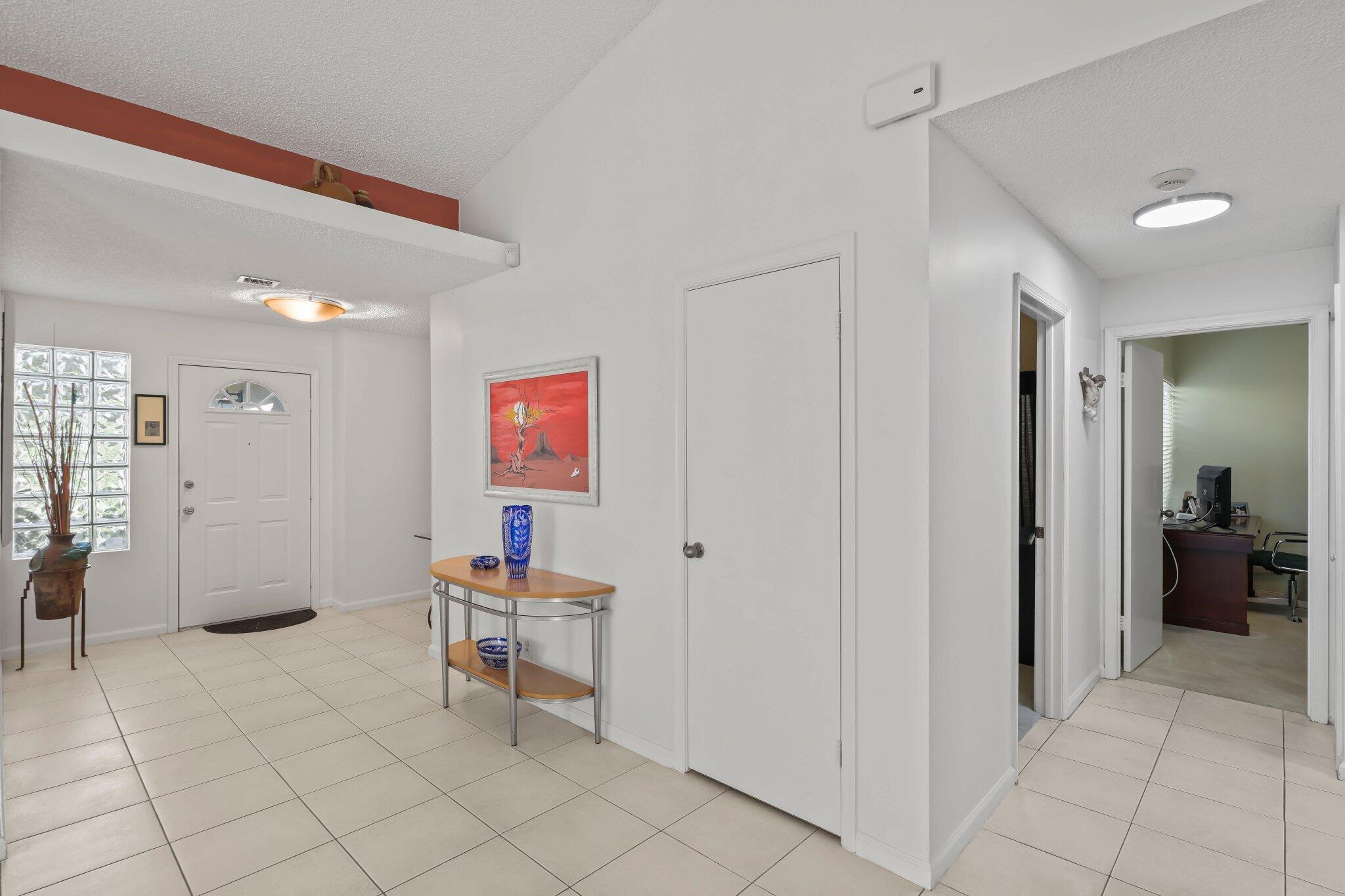 10678 Santa Laguna Drive Boca Raton, FL 33428 - Photo 13 of 40 a room with furniture and air hockey table