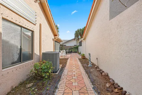 a narrow alley leading to a building