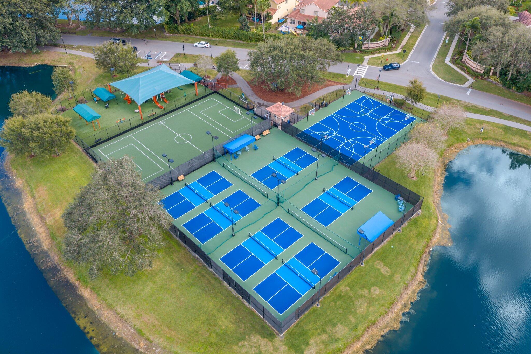 10678 Santa Laguna Drive Boca Raton, FL 33428 - Photo 37 of 40 swimming pool with a couch and chairs