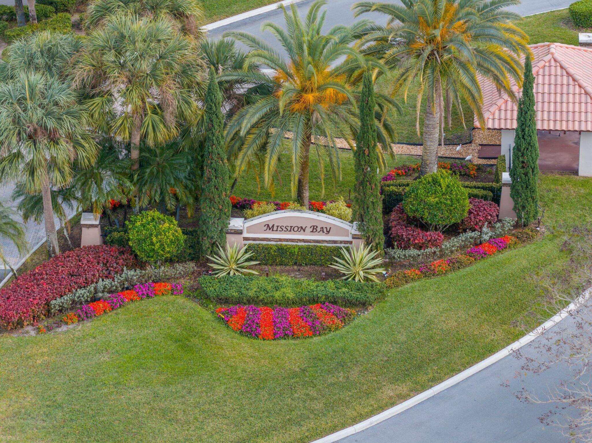 10678 Santa Laguna Drive Boca Raton, FL 33428 - Photo 38 of 40 a view of a backyard with a garden and plants