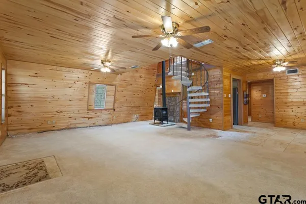 a bathroom with a shower and a sink