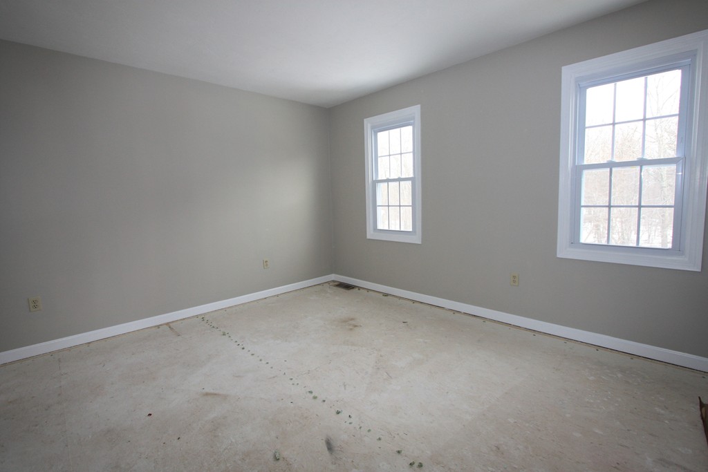14 Cedar Hill Road Sutton, MA 01590 - Photo 14 of 16 an empty room with a window