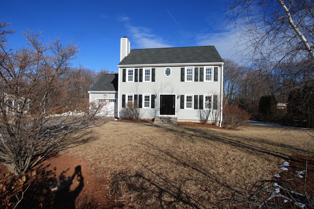 14 Cedar Hill Road Sutton, MA 01590 - Photo 3 of 16 a view of a large house with a yard