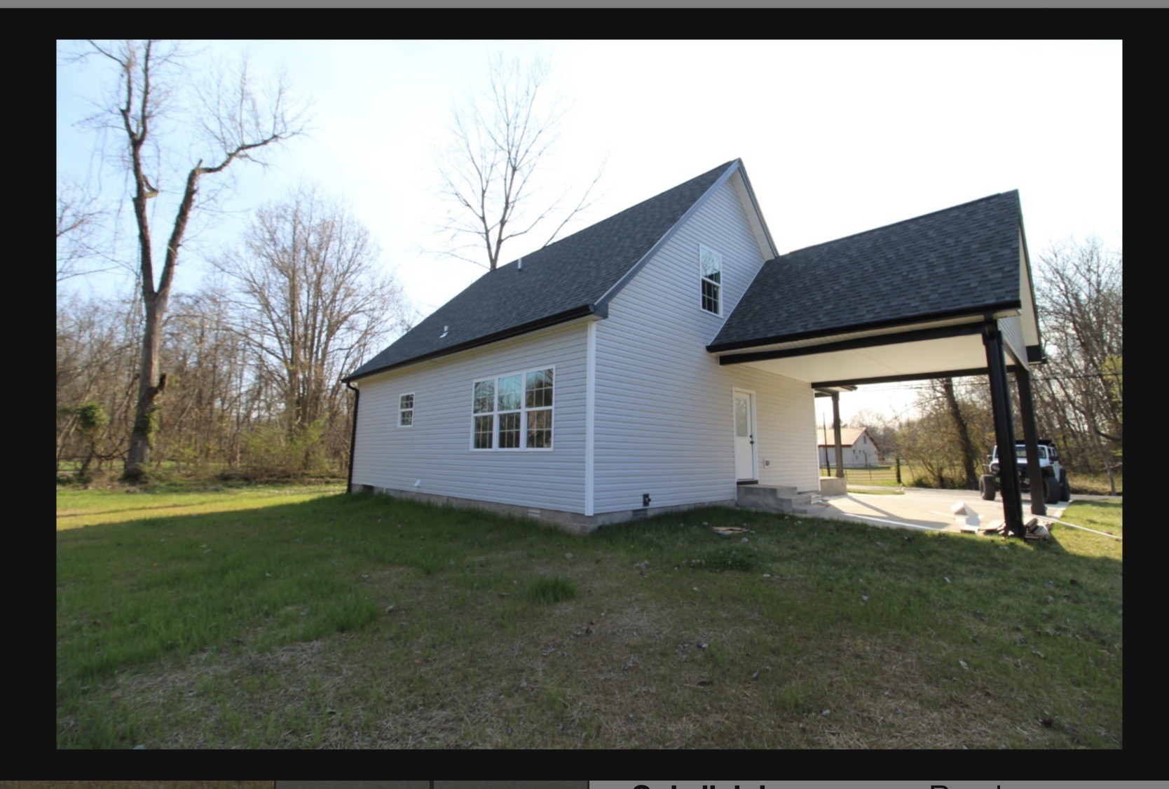 574 Russell Street Guthrie, KY 42234 - Photo 3 of 15 a view of a house with a yard