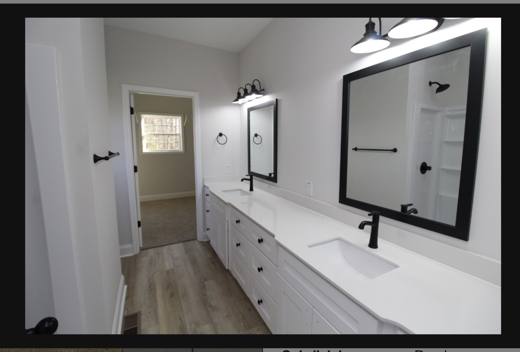 574 Russell Street Guthrie, KY 42234 - Photo 9 of 15 a bathroom with a double vanity sink and mirror