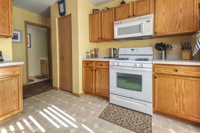 a kitchen with a stove and a sink