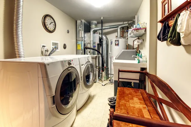 a view of storage and utility room with racks on the wall