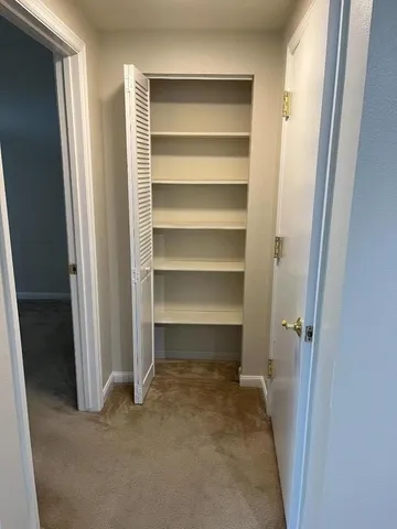 a view of a bench in a park