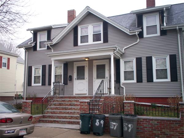 a front view of a house with parking