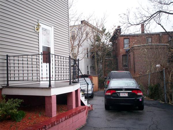 57-59 Myrtle Street Somerville, MA 02145 - Photo 14 of 30 a view of a car park in front of house