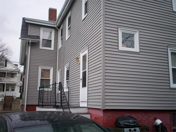 57-59 Myrtle Street Somerville, MA 02145 - Photo 15 of 30 a front view of a house with street