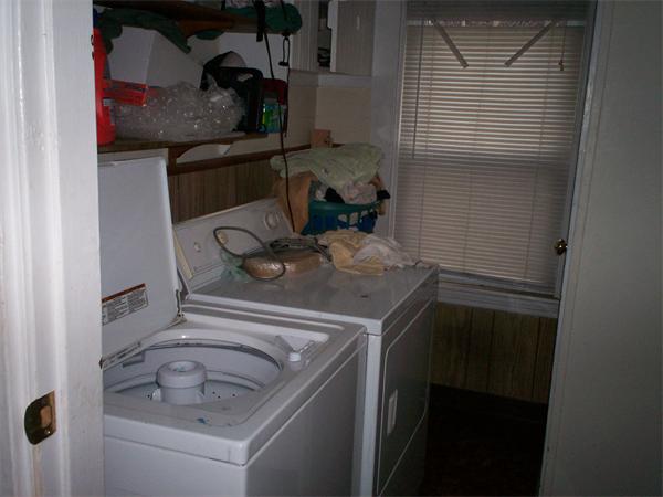 57-59 Myrtle Street Somerville, MA 02145 - Photo 20 of 30 a utility room with dryer and washer