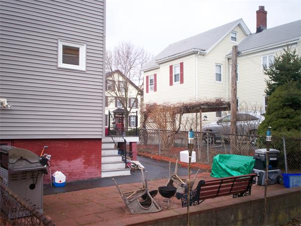 57-59 Myrtle Street Somerville, MA 02145 - Photo 26 of 30 a view of a chairs and tables in patio