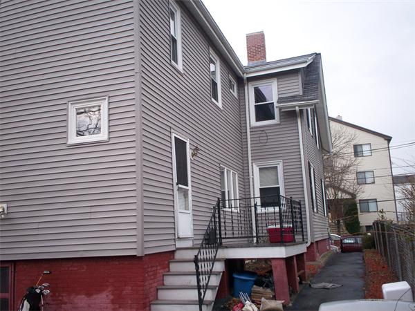 57-59 Myrtle Street Somerville, MA 02145 - Photo 27 of 30 a view of a chairs and table in a balcony