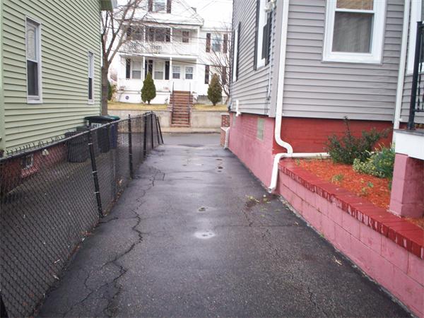 57-59 Myrtle Street Somerville, MA 02145 - Photo 29 of 30 a view of a street with sitting area