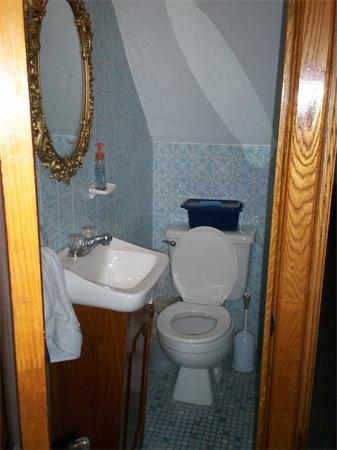 57-59 Myrtle Street Somerville, MA 02145 - Photo 8 of 30 a bathroom with a sink and a mirror