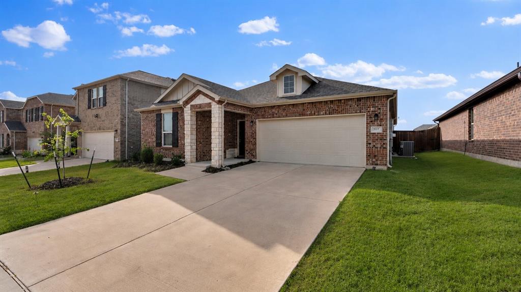 707 Indigo Road Princeton, TX 75407 - Photo 28 of 29 Brick exterior with stone accents and a covered entry