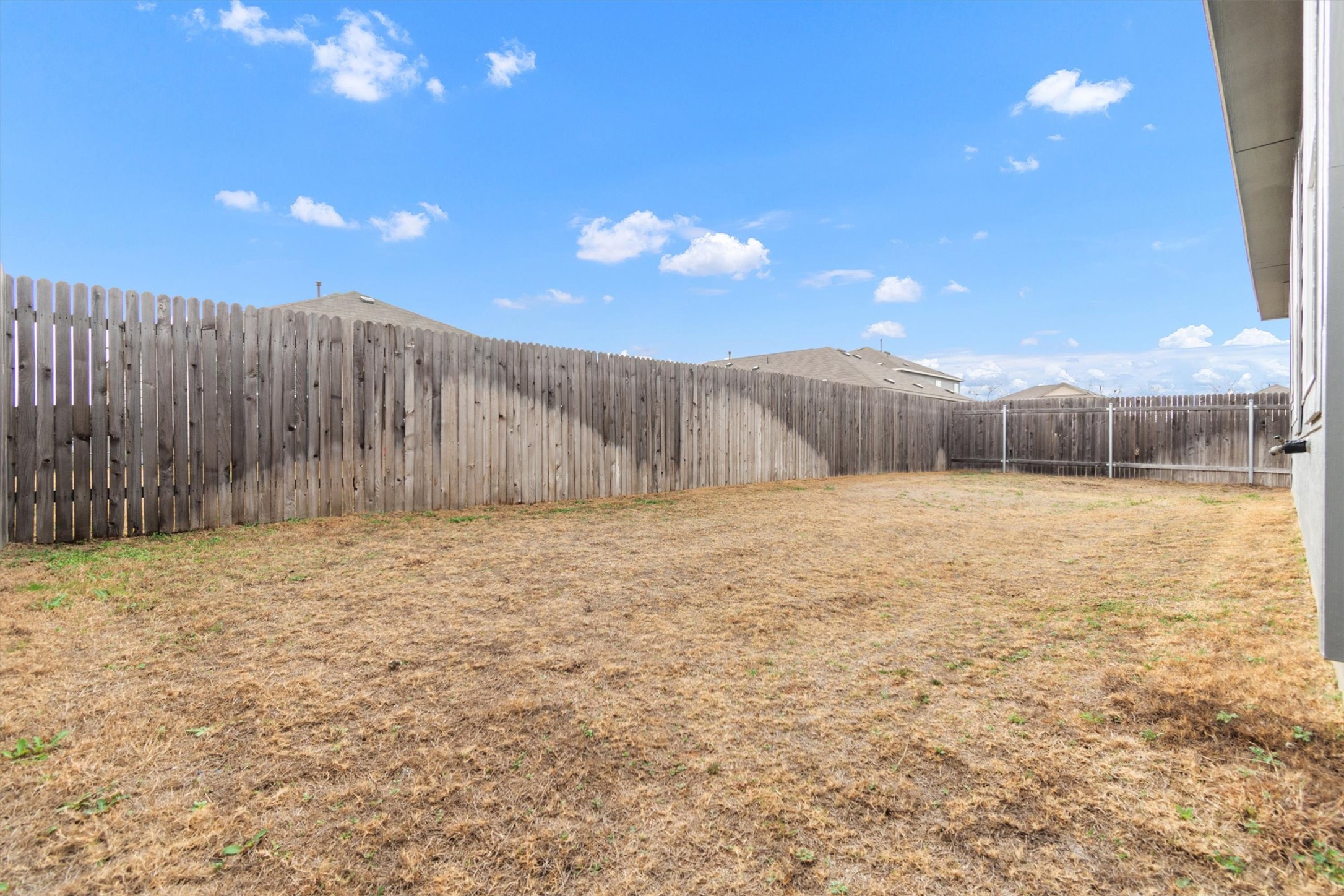 301 Blue Springs Pass Kyle, TX 78640 - Photo 18 of 20 View of fenced backyard