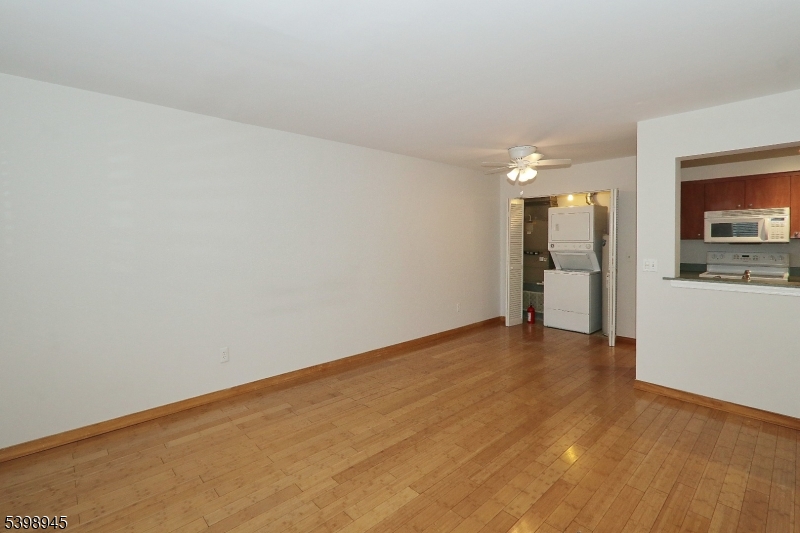 21 Parkside Road Bedminster, NJ 07921 - Photo 9 of 17 a view of a kitchen with a refrigerator
