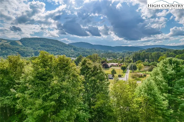 a view of a lake with a building in the background
