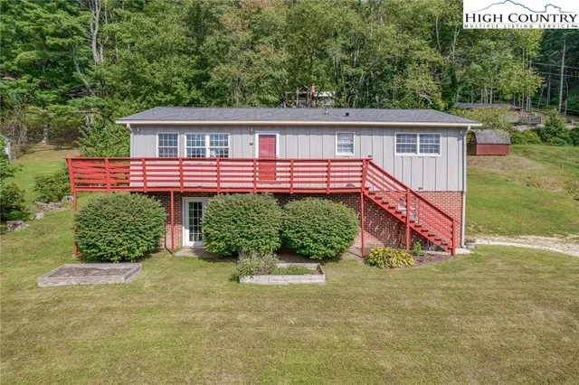 a view of balcony with wooden floor
