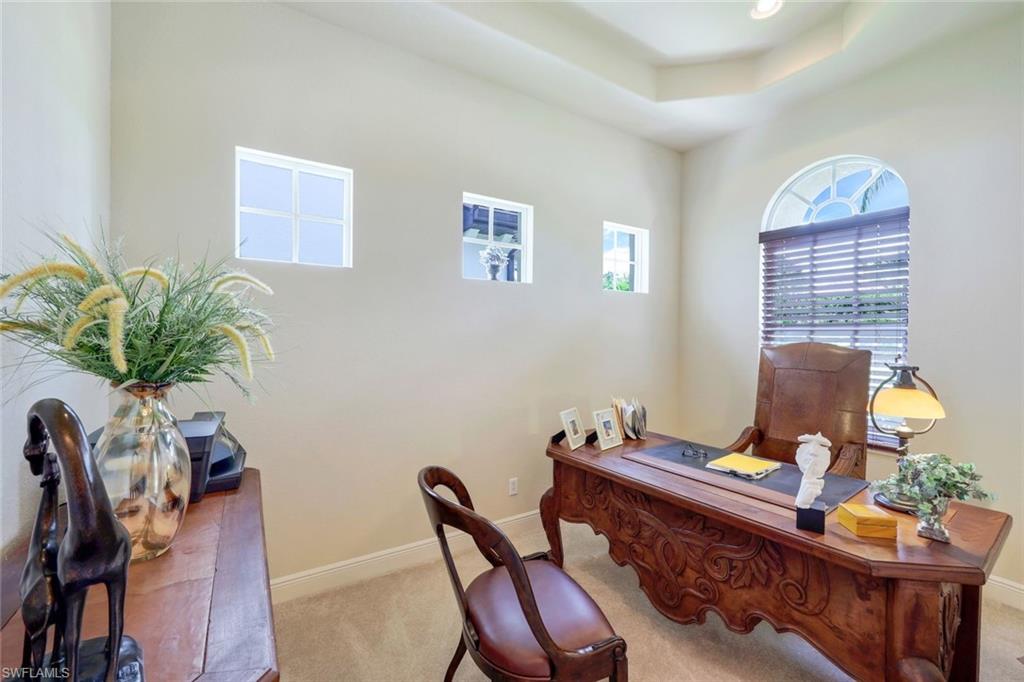 5797 Mango Circle, Unit 5797 Naples, FL 34110 - Photo 4 of 22 a view of a workspace with furniture