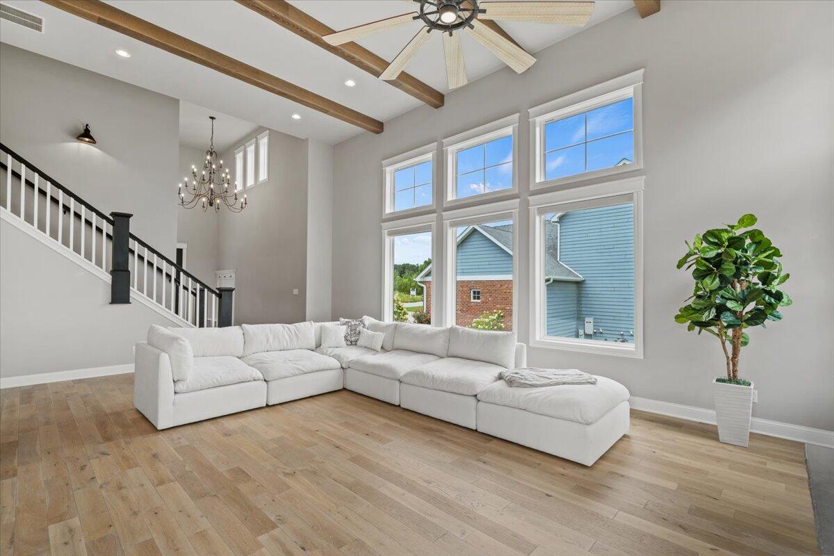 12893 Baker Court Crown Point, IN 46307 - Photo 11 of 52 a living room with furniture and a large window