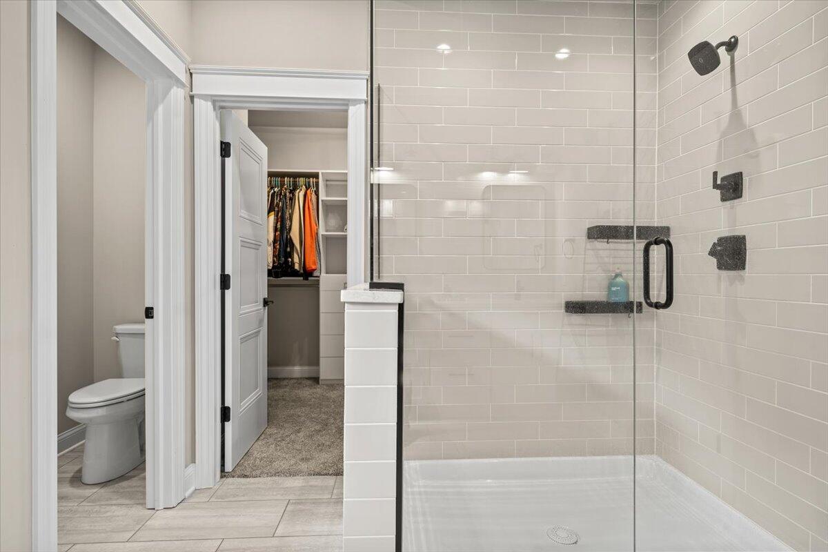 12893 Baker Court Crown Point, IN 46307 - Photo 22 of 52 a bathroom with a shower