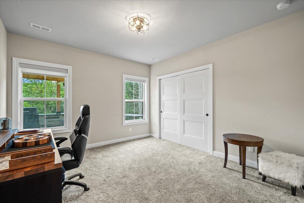 12893 Baker Court Crown Point, IN 46307 - Photo 36 of 52 a view of a workspace with furniture and a window