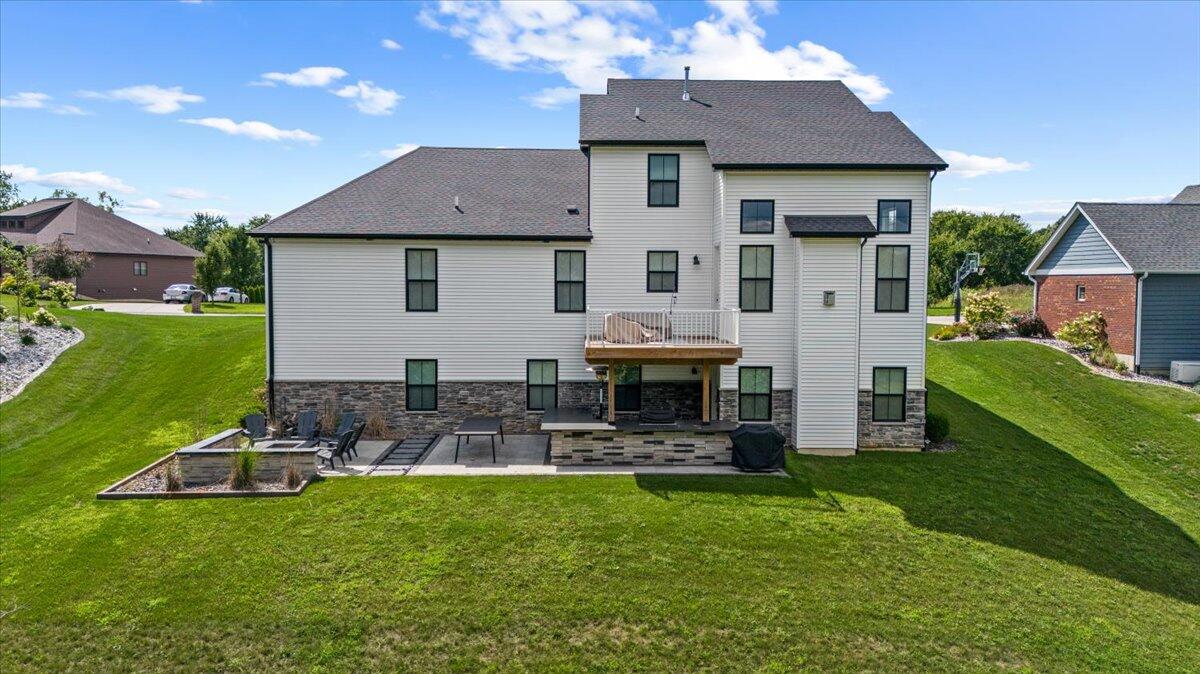 12893 Baker Court Crown Point, IN 46307 - Photo 47 of 52 a front view of house with yard and outdoor seating
