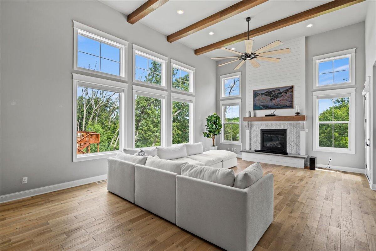 12893 Baker Court Crown Point, IN 46307 - Photo 10 of 52 a living room with furniture fireplace and flat screen tv