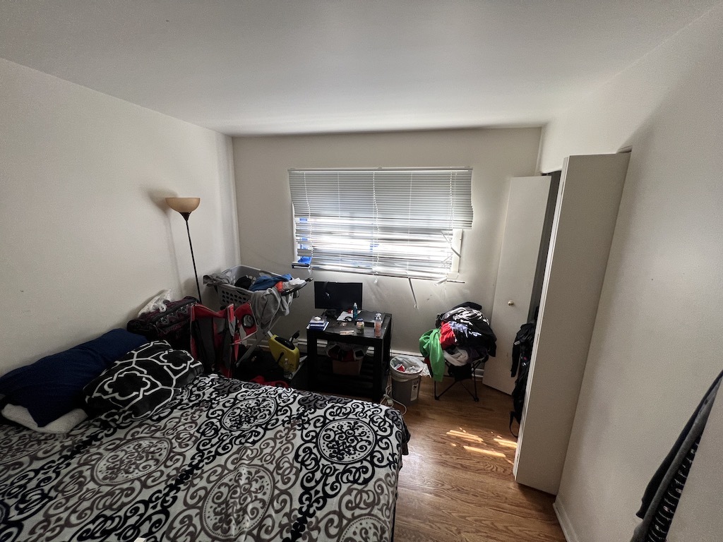 568 Ida Court Mount Prospect, IL 60056 - Photo 11 of 25 a bedroom with furniture and a window