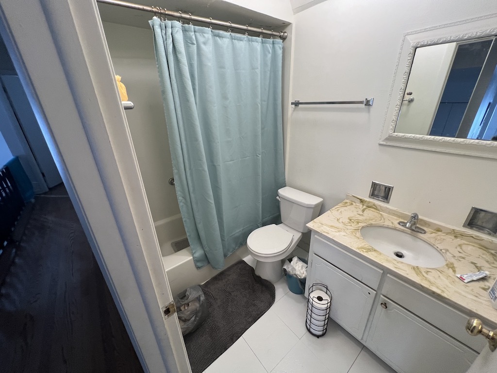 568 Ida Court Mount Prospect, IL 60056 - Photo 13 of 25 a bathroom with a sink and a mirror