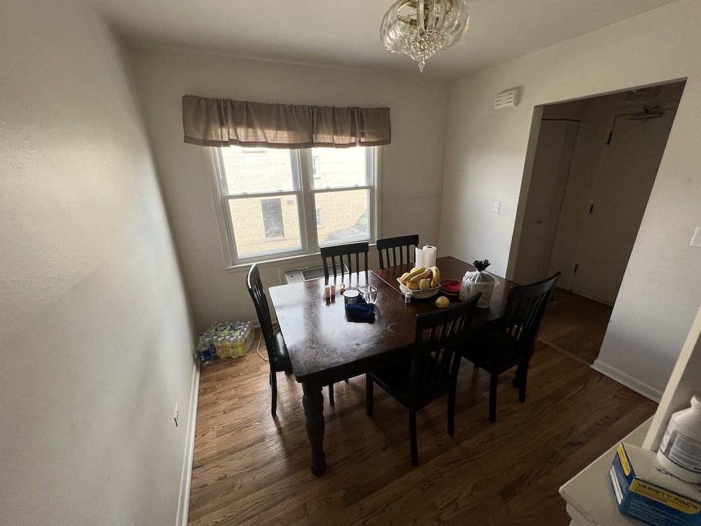 568 Ida Court Mount Prospect, IL 60056 - Photo 16 of 25 a view of a dining room with furniture window and wooden floor