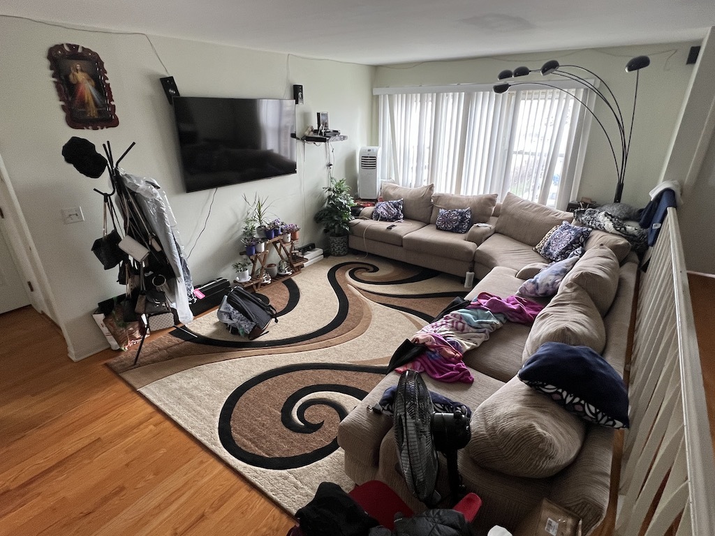 568 Ida Court Mount Prospect, IL 60056 - Photo 20 of 25 a living room with furniture and a flat screen tv