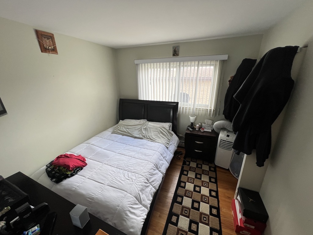 568 Ida Court Mount Prospect, IL 60056 - Photo 21 of 25 a bedroom with a bed and a window