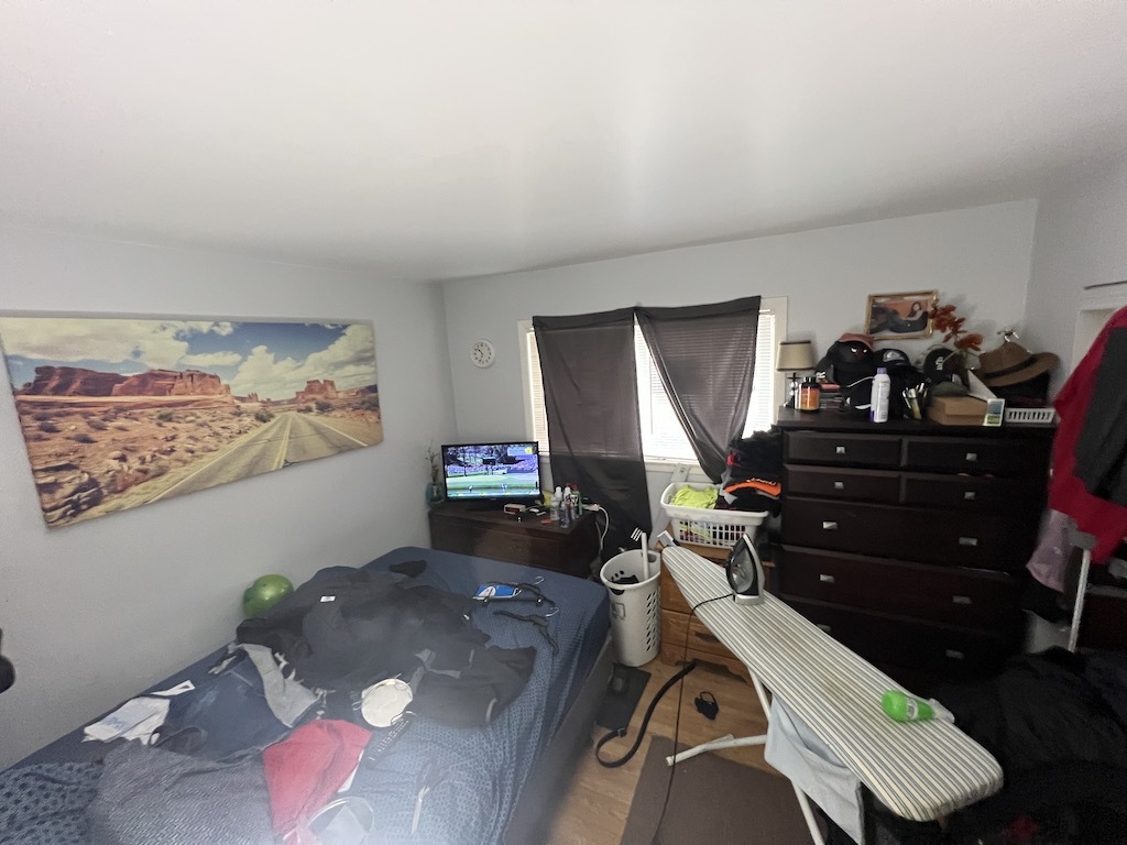 568 Ida Court Mount Prospect, IL 60056 - Photo 8 of 25 a living room with furniture and a flat screen tv