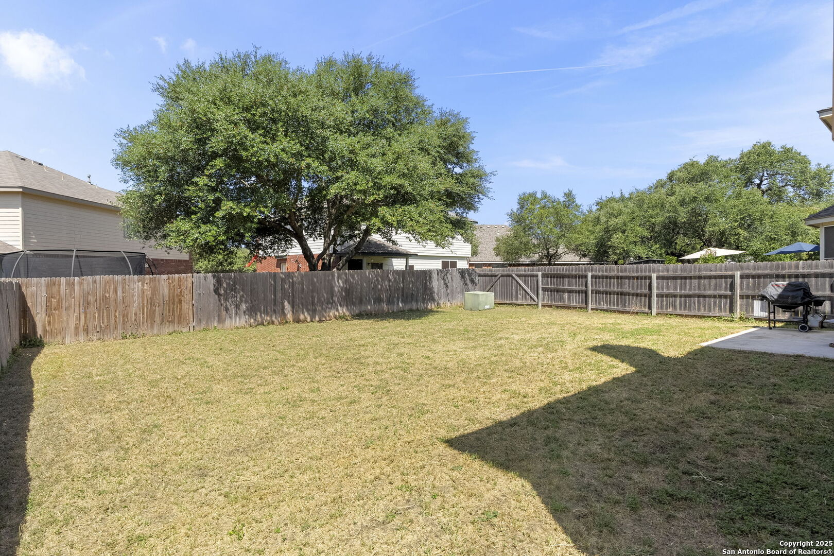 8747 Feather Trail Helotes, TX 78023 - Photo 30 of 34 a view of a swimming pool with an outdoor space